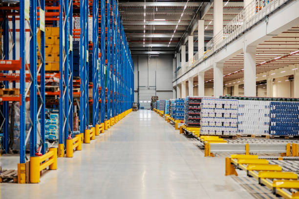istock Big warehouse full of goods and boxes. 1963272732