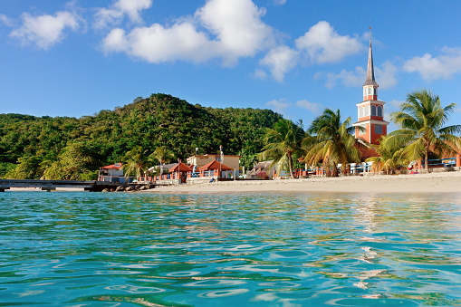 Beach of Les Anses-d'Arlet with it's iconic church, located on the southern part of the island of Martinique.