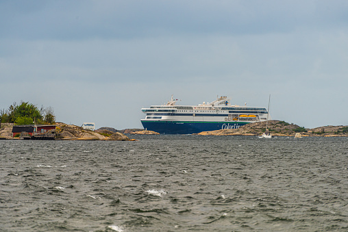 Strömstad, Sweden - July 31 2021: Passenger ferry Color Hybrid arriving Strömstad.