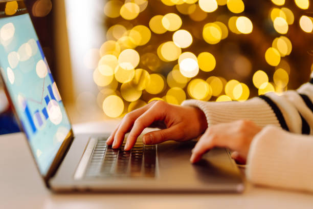 istock Close-up of hands working on a laptop keyboard. 1963294188