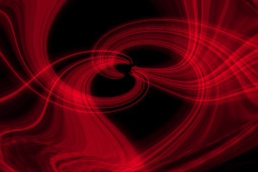 Abstract background made of glowing light trails forming a heart shape in the center