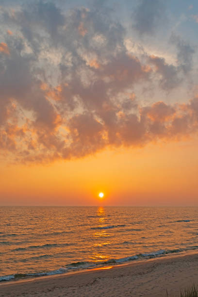 istock Clouds and Haze on a Lake Michigan Sunset 1963347463