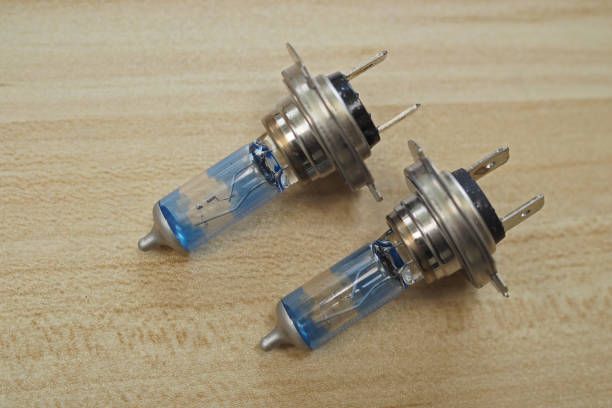 istock Close up of H7 headlight car bulbs 1963358401