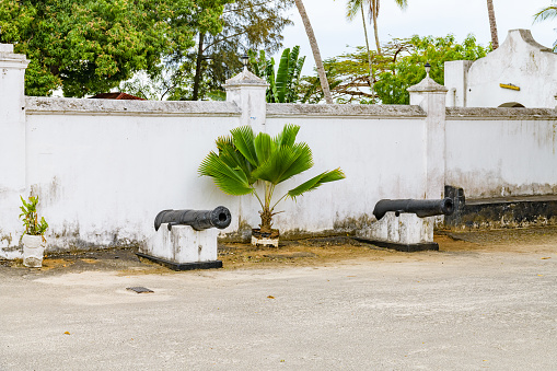 Old rusty colonial cannons near Kibweni palace museum in Stone Town. Zanzibar, Tanzania