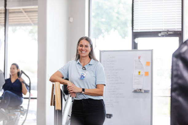 istock Experienced female occupational therapist poses for photo 1963396692