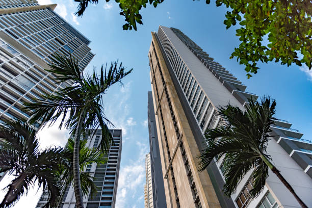 istock Sprawling daytime cityscape with towering buildings adjacent to a grand structurex 1963411540