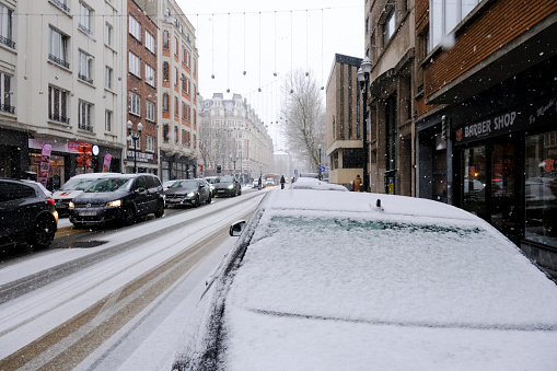 Cars covered with snow after heavy snowfall hit Brussels in Belgium on January 17, 2024.