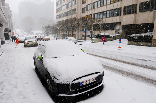 Cars covered with snow after heavy snowfall hit Brussels in Belgium on January 17, 2024.