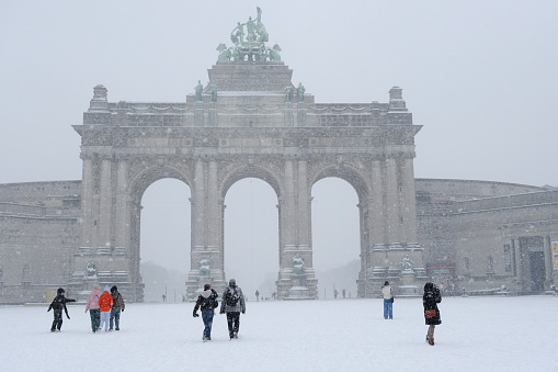 View of the snow covered Cinquantenaire Arch after heavy snowfall hit Brussels in Belgium on January 17, 2024.
