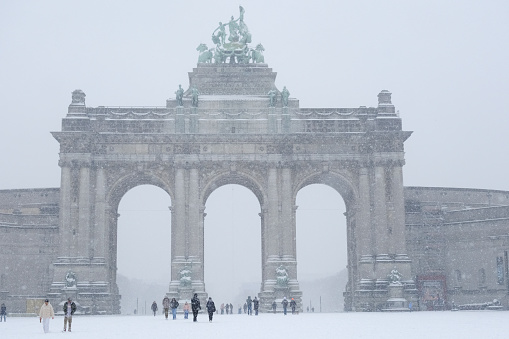 People enjoy the snow in Cinquantenaire Park after heavy snowfall hit Brussels in Belgium on January 17, 2024.