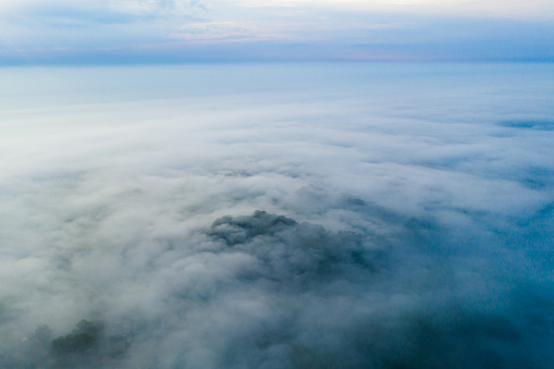 Foggy morning landscape aerial view.