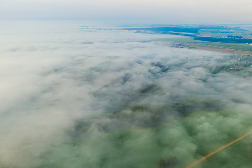 Foggy morning landscape aerial view.