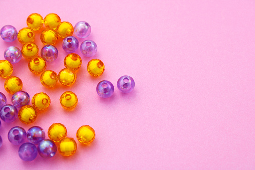 Yellow and purple beads to make necklaces and bracelets