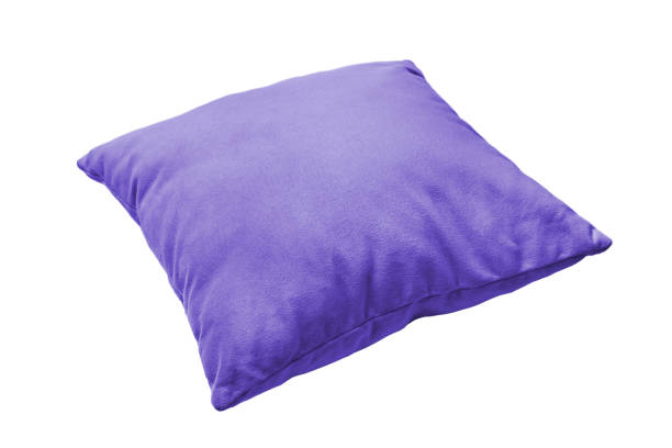 Cтоковое фото Decorative purple rectangular pillow for sleeping and resting isolated on white background