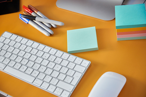 Sticky Note Pads on brightly coloured Home Office Desk