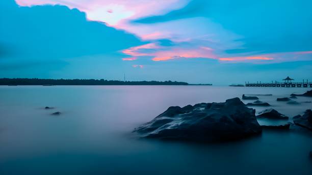 istock Beautiful calm beach view at dusk 1963613314