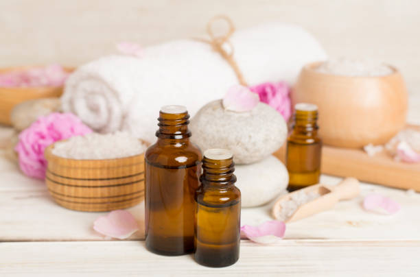 istock Spa composition with pink roses on wooden table 1963662187