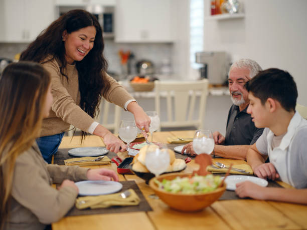 istock Familiy Dinner in a Home 1963698030