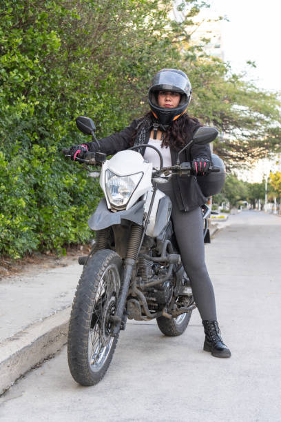 istock Confident Female Biker in Casual Gear 1963786813