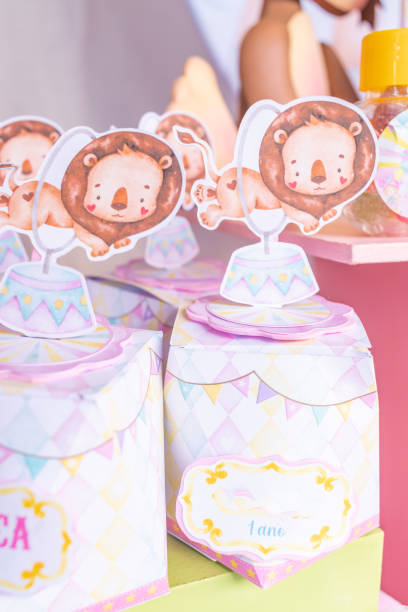 Girl's birthday party decorations with animals, sweets, rose and panel with drawings
