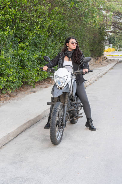 istock Young woman Posing on a Dirt Bike 1963794095