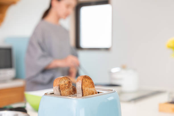 istock toast some bread, woman cooks in a kitchen 1963887716