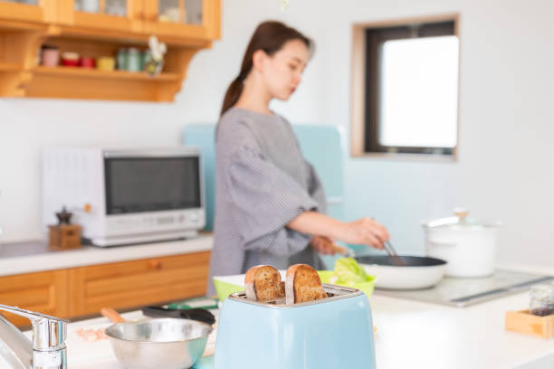 istock toast some bread, woman cooks in a kitchen 1963888268