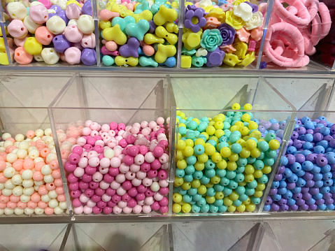 a pile of beads of various colors, usually used to make handicraft arts