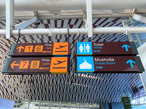 sign board on airport, like arrival, departure, toilet, dan prayer room