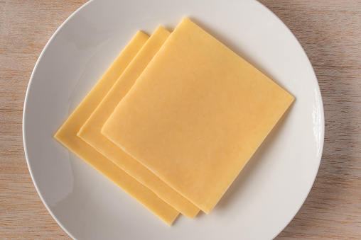 Gouda Cheese Slices on a Plate