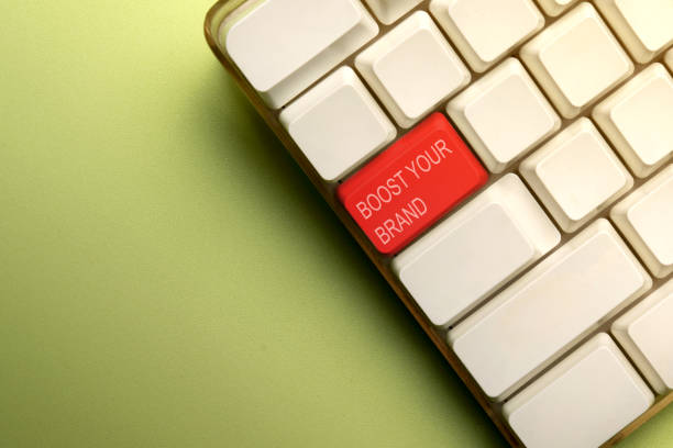 istock Words of Boost Your Brand on the computer keyboard button 1963965229