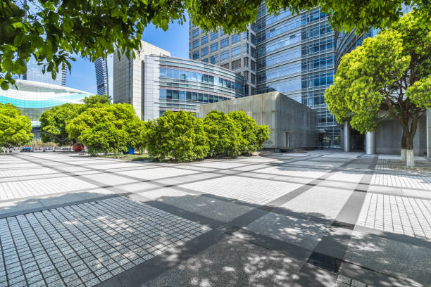 istock modern buildings and empty pavement in china 1964002134