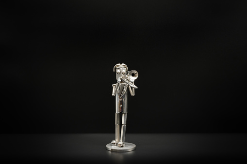 Trombonist figure (metal figure)