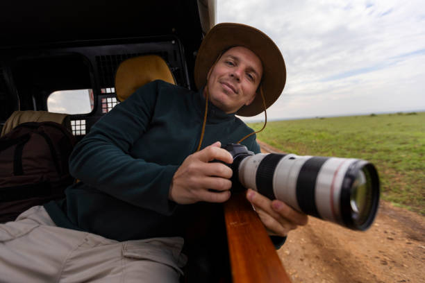 istock Photographer at safari tour 1964108406