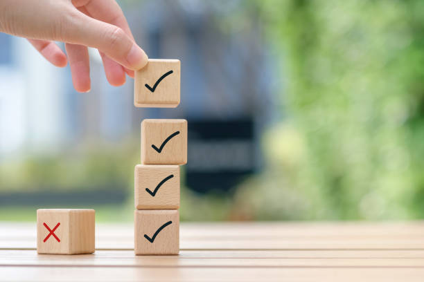 istock Replace reject with correct or approve sign to top of wooden stack. Goals achievement and business success concept. 1964195575
