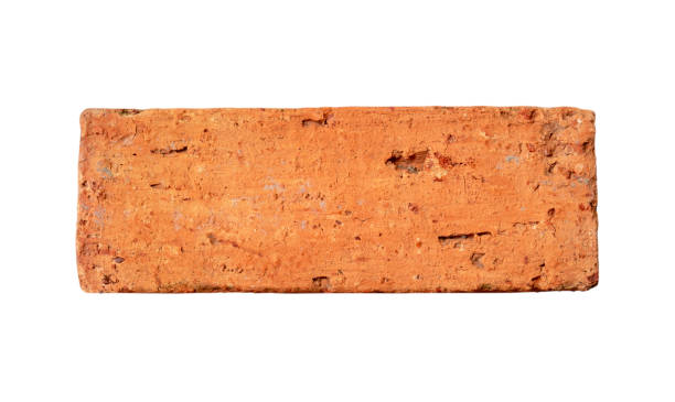 istock Single old cracked red or orange brick isolated on white background with clipping path 1964196648
