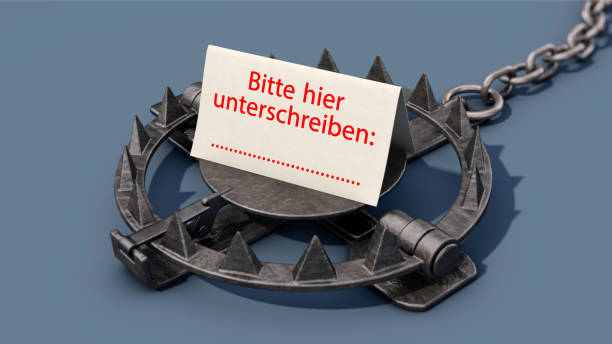 A trap with the German text "Bitte hier unterschreiben" (Please sign here) Symbolic image: A trap with the German text "Bitte hier unterschreiben" (Please sign here) unterschreiben stock pictures, royalty-free photos & images