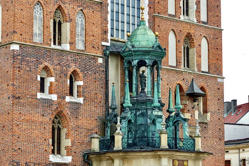 Fragment of the Church of St. Mary or the Church of the Assumption of the Blessed Virgin Mary - a Catholic church of Gothic architecture, which in 1962 received the title of a minor basilica, Krakow.
