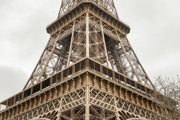 France, Paris - Jan 4, 2024 - Architectural detail design of the famous Eiffel Tower iron structure. Close-up of the framework of the Eiffel Tower in Paris, France, Space for text, Selective focus.