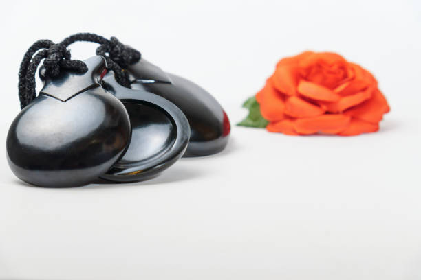 istock black castanets isolated on white background 1964279275