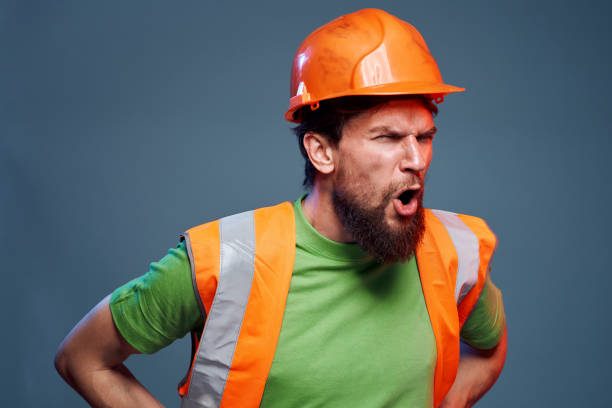 istock emotional worker orange hard hat construction cropped view 1964340242