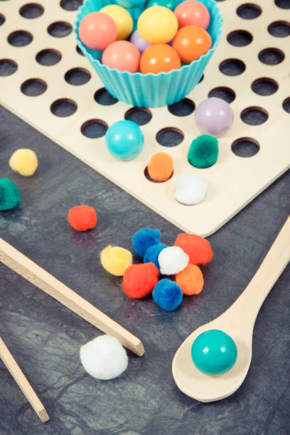 istock Colorful balls. Development of kids motor skills, coordination, creativity and logical thinking 1964366314