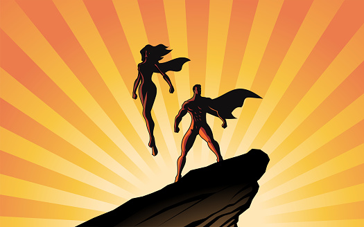 A silhouette style vector illustration of a superhero couple standing on a rock. Sunburst effect in the background. Easy to grab and edit. Wide space available for your copy.
