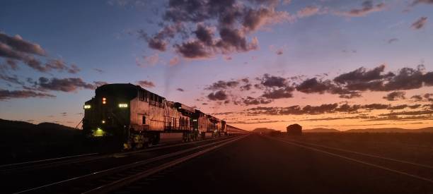 istock Sun Sets on an Iron Ore Train in The Pilbara 1964382541