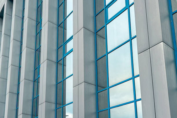 istock Glass windows on a multi-story building as an abstract background. Texture 1964413172