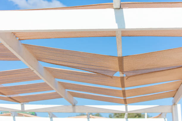 istock Canopy with white fabric on the beach 1964419426