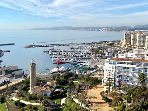 Panoramic view of the harbour, marina and lighthouse in Estepona in southern Spain