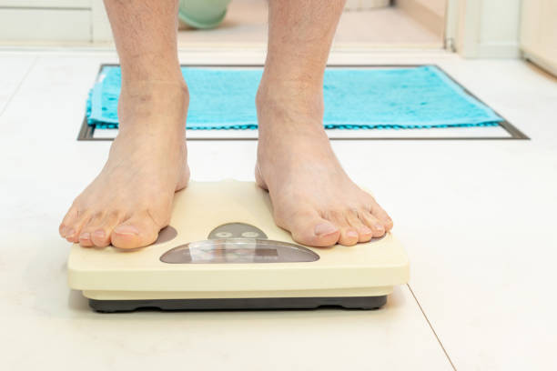 istock Weight measurement in the bathroom dressing room 1964460358