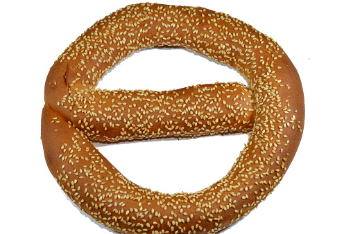 Simit, rosquilla, a circular bread, typically encrusted with sesame seeds or, less commonly, poppy, flax or sunflower seeds, found across the cuisines of the former Ottoman Empire, gevrek, crisp, selective focus