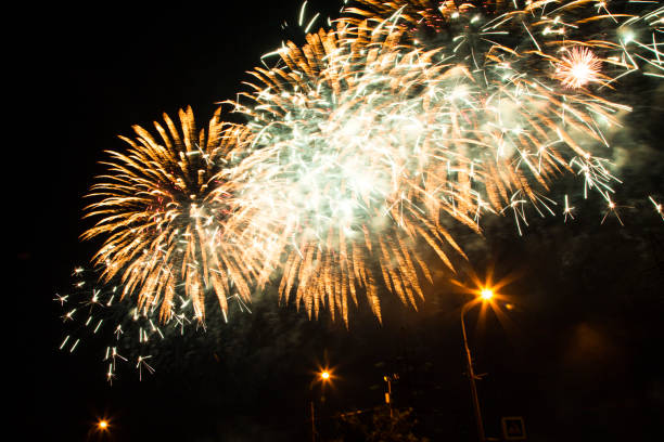 istock brigh tmulti-colored fireworks in the night sky 1964503393